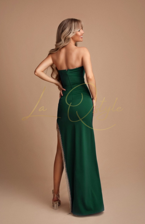 Dopasowana sukienka z gorsetem i zdobionym rozcięciem BUTELKOWA ZIELEŃ