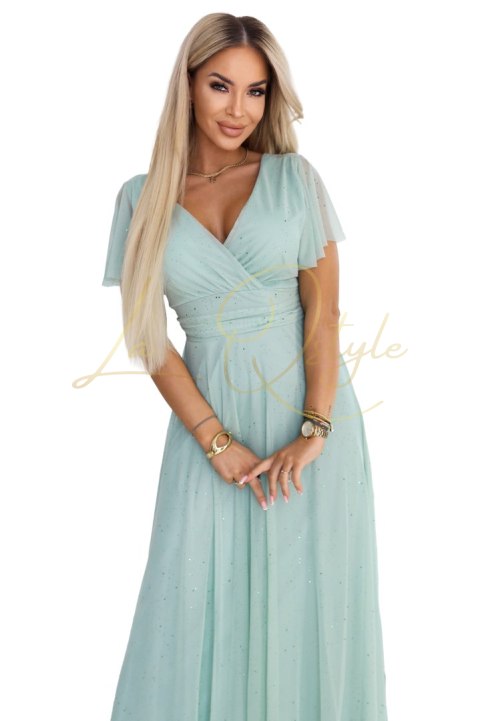 Długa błyszcząca suknia z dekoltem i krótkim rękawkiem PISTACJOWA