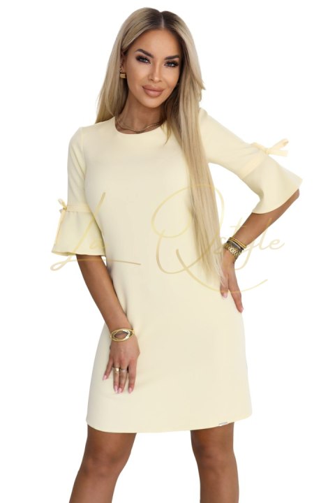 Kobieca trapezowa sukienka z wiązaniem na rękawkach - pastelowy ŻÓŁTY