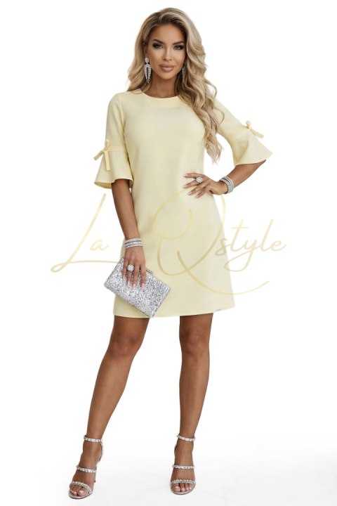 Kobieca trapezowa sukienka z wiązaniem na rękawkach - pastelowy ŻÓŁTY