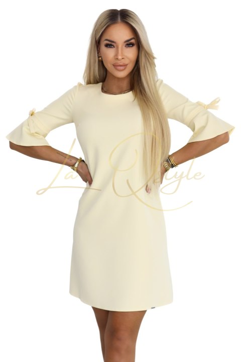 Kobieca trapezowa sukienka z wiązaniem na rękawkach - pastelowy ŻÓŁTY