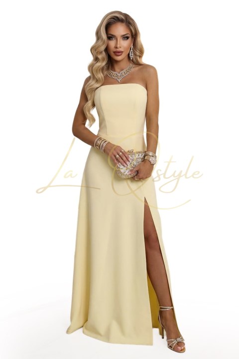 Gorsetowa sukienka maxi z rozcięciem i wiązaniem na plecach MASEŁKOWY ŻÓŁTY