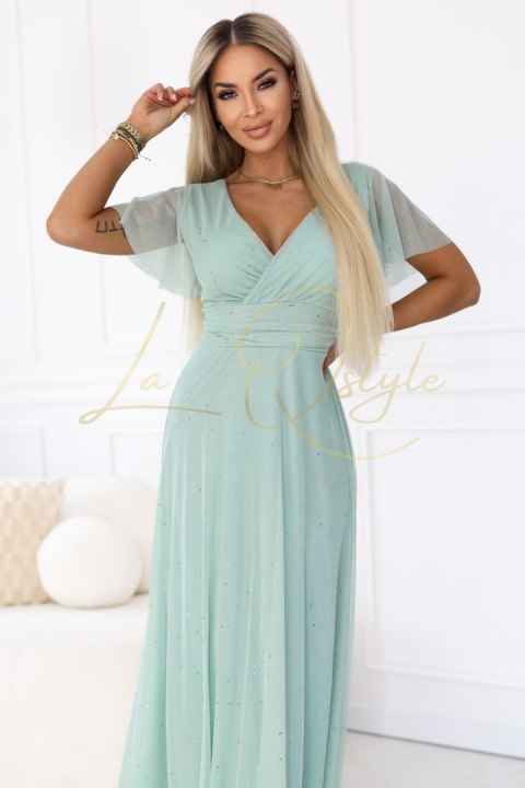 Długa błyszcząca suknia z dekoltem i krótkim rękawkiem PISTACJOWA