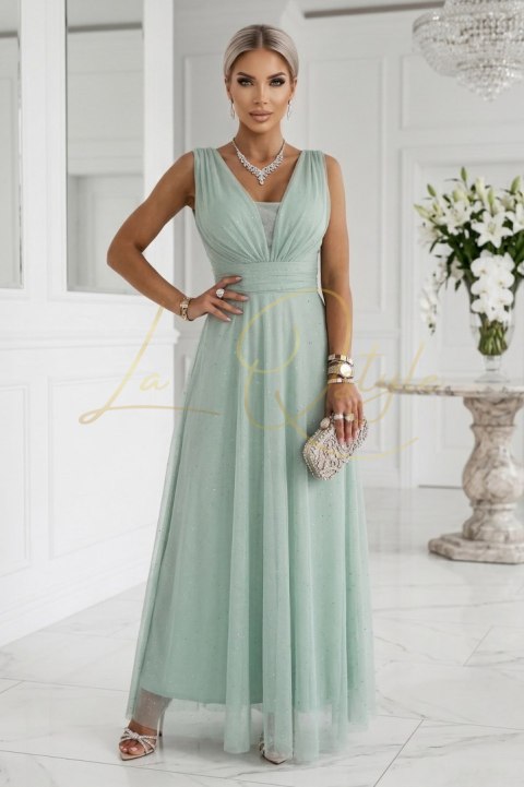 Długa sukienka maxi z brokatowym akcentem i głębokim dekoltem PISTACJOWA