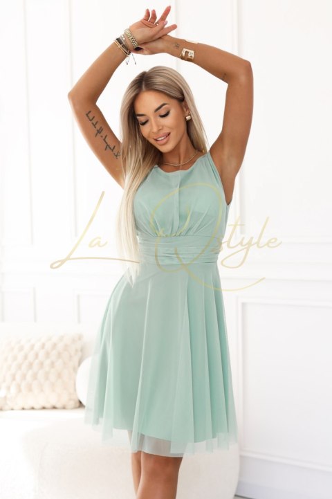 676-4 Sukienka na wesele z tiulową warstwą i podkreśloną talią - pistacjowa